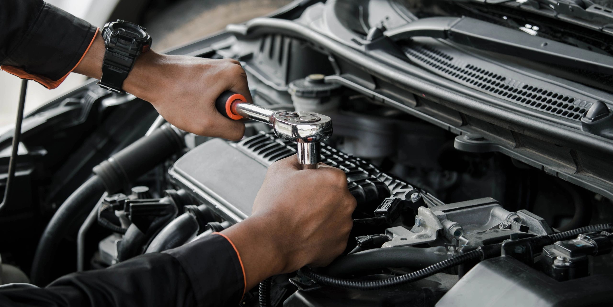 Mechanic performing auto repair
